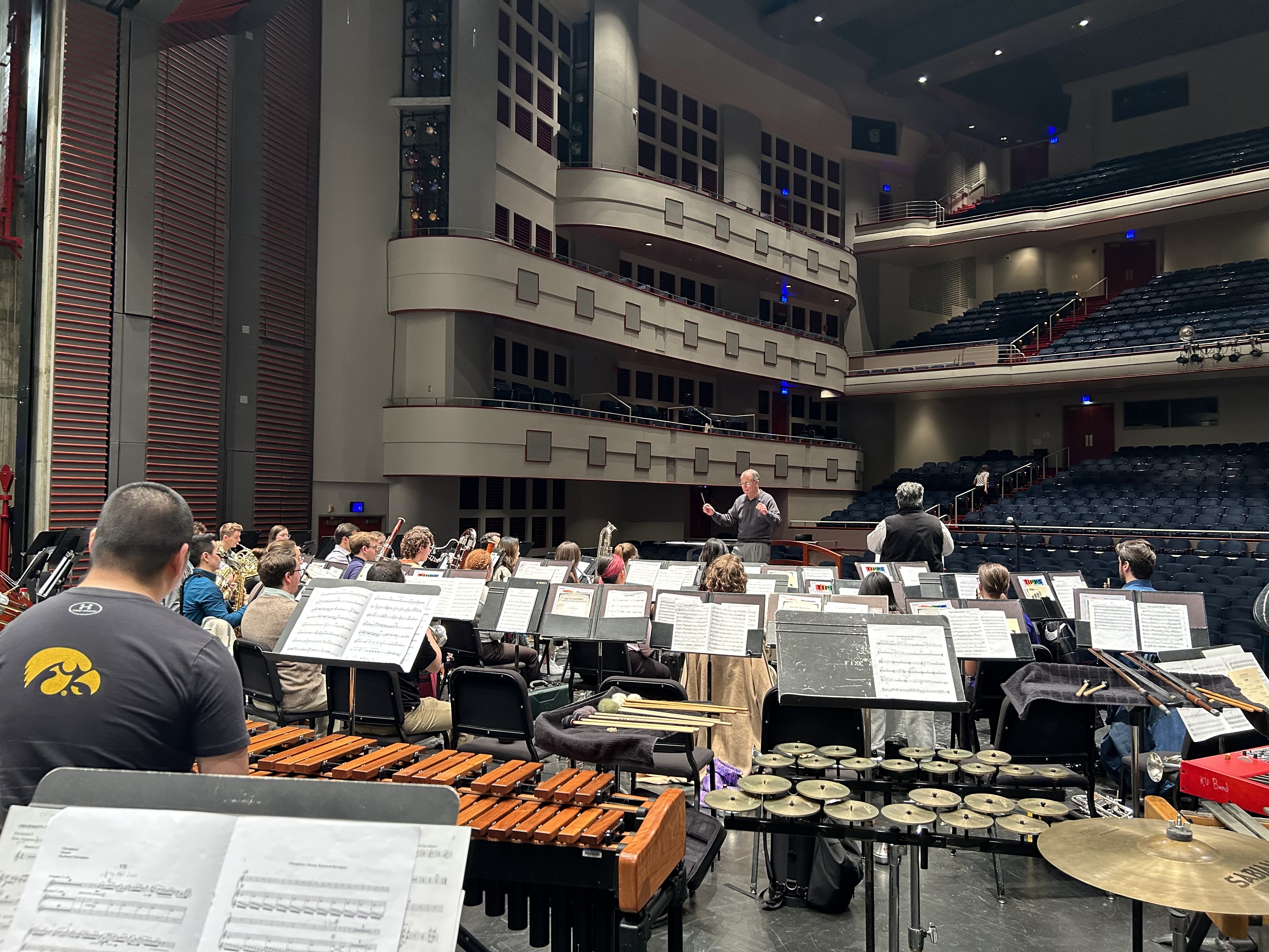  Full Circle - Moss rehearses the Univeristy of Iowa Symphony Band at the 88th ABA Convention (2023). Mvmt. 3 - Concerto for Clarinet and Wind Ensemble (Ticheli). Jorge Montilla, soloist 