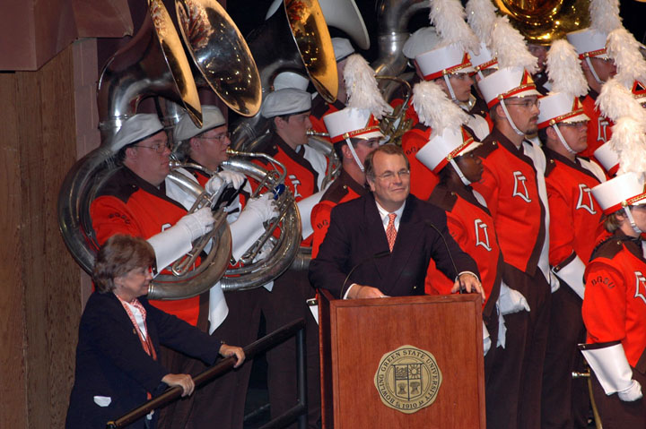  Dr. Moss speaks at Sounds of the Stadium (2004) in Kobcker Hall as Dr. Carol Hayward looks on (photo: Bill Hayward) 