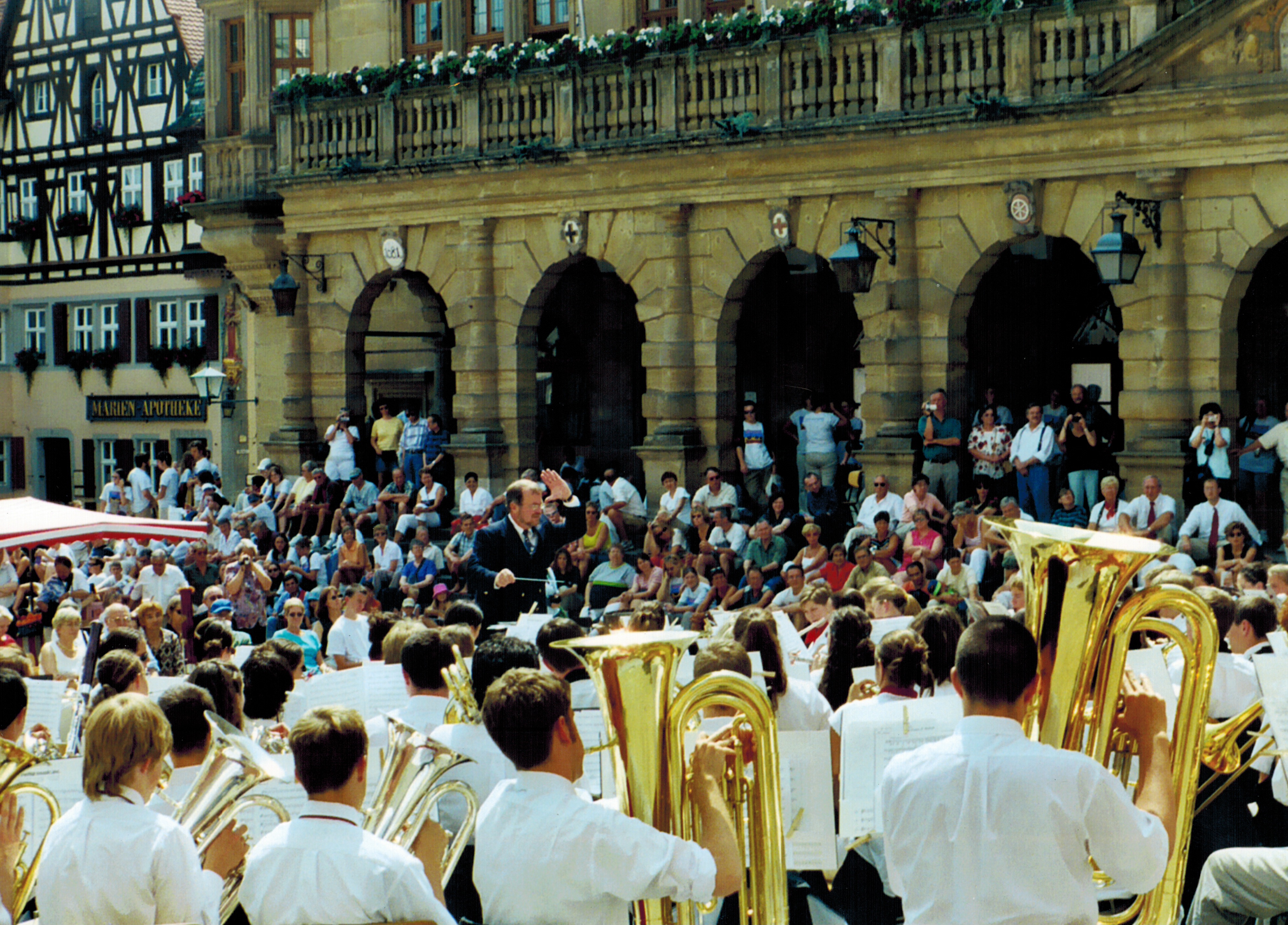  Dr. Moss conducting before an enthusiastic crowd in Rotenberg Germany (2003) 