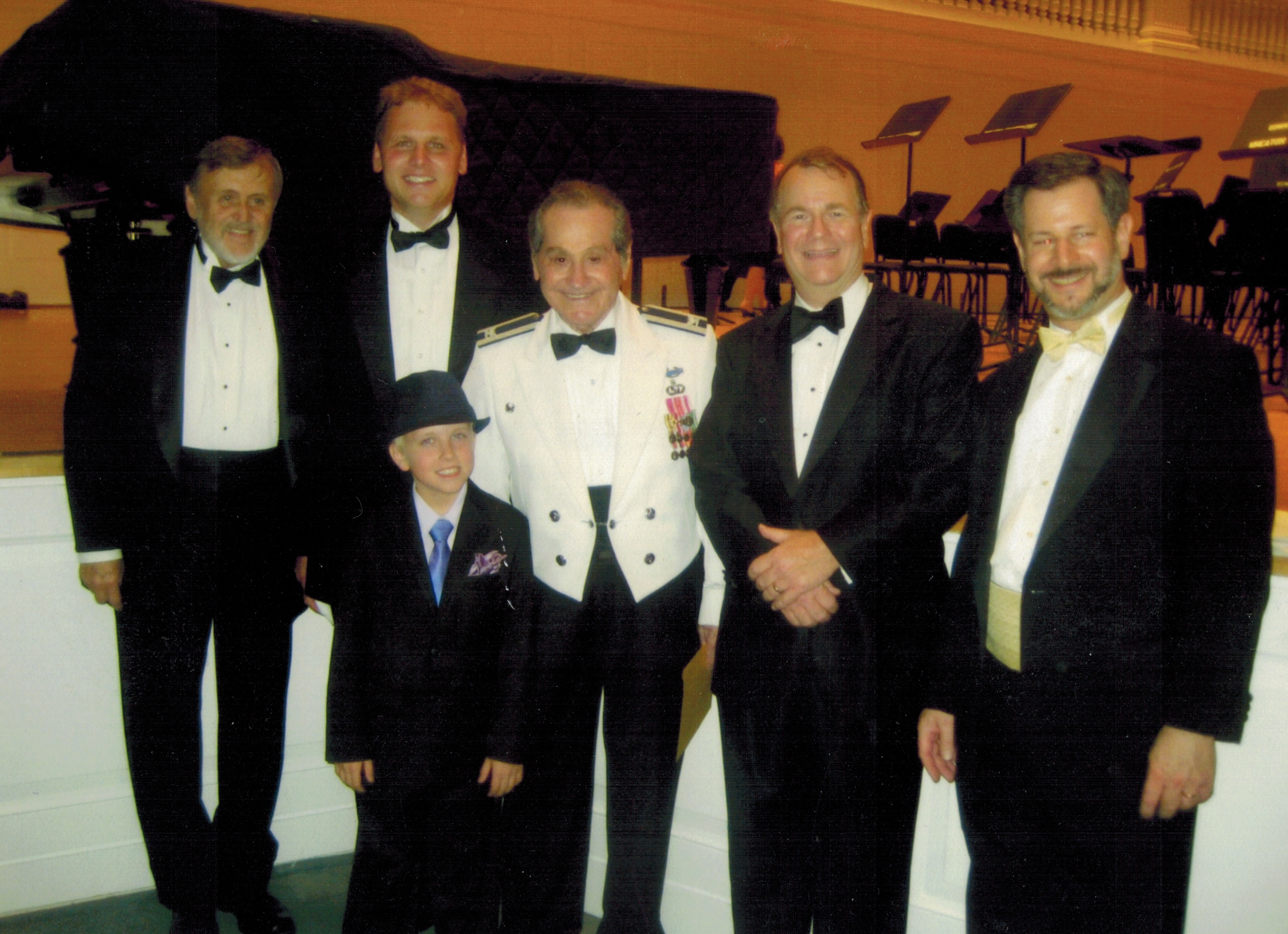  Richard Mathey, Shawn Mathey, Col. Arnald Gabriel, Dr. Moss, and Pete Friedmann. The boy pictured here (first name Geoff) was a trumpet soloist!   