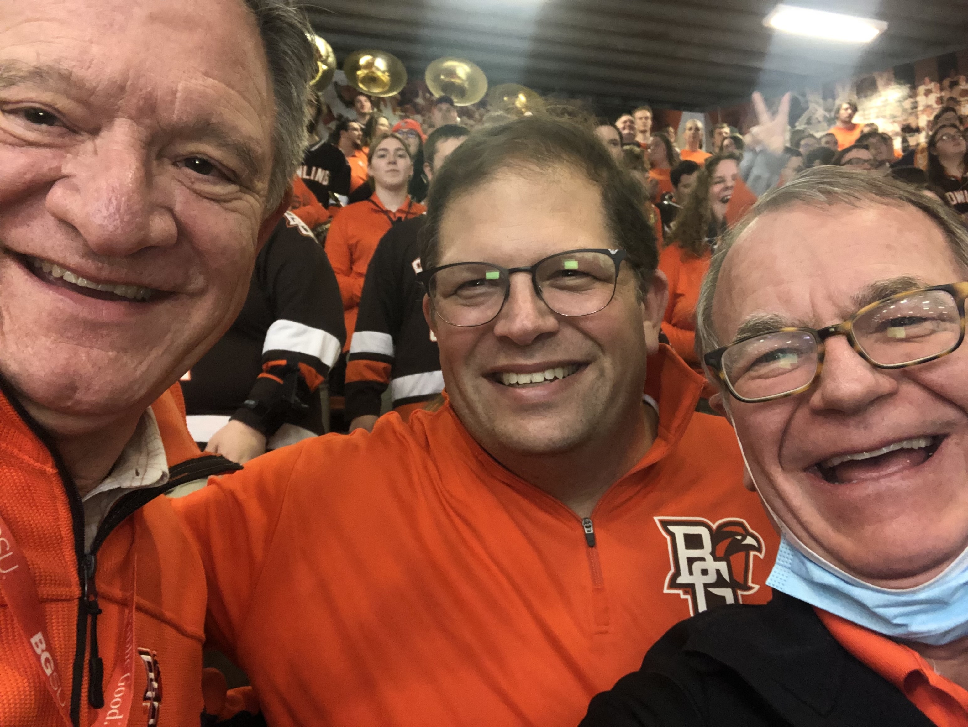  Dr. Moss with Jon Waters and BGSU President Rodney Rogers at BGSU Hockey (Feb. 2023) 